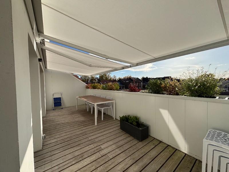 Pose de deux stores de terrasse avec lambrequin à Lille