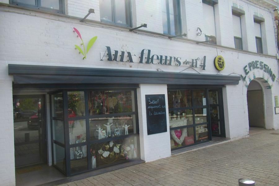 POSE D'UN STORE DE TERRASSE À STEENVOORDE AU FLEURS DU NUMÉRO 4