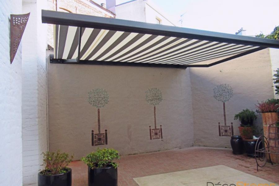 POSE D'UN STORE DE TERRASSE À DOUAI DANS LE NORD DES HAUTS-DE-FRANCE