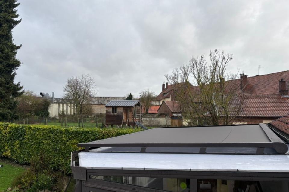 Installation d'un store de toiture de véranda à Auxi le Château
